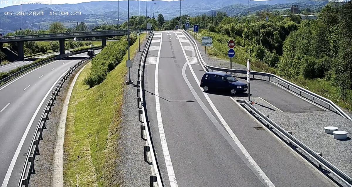 Vehicle turning to a safe island to make a u-turn back to the right direction.